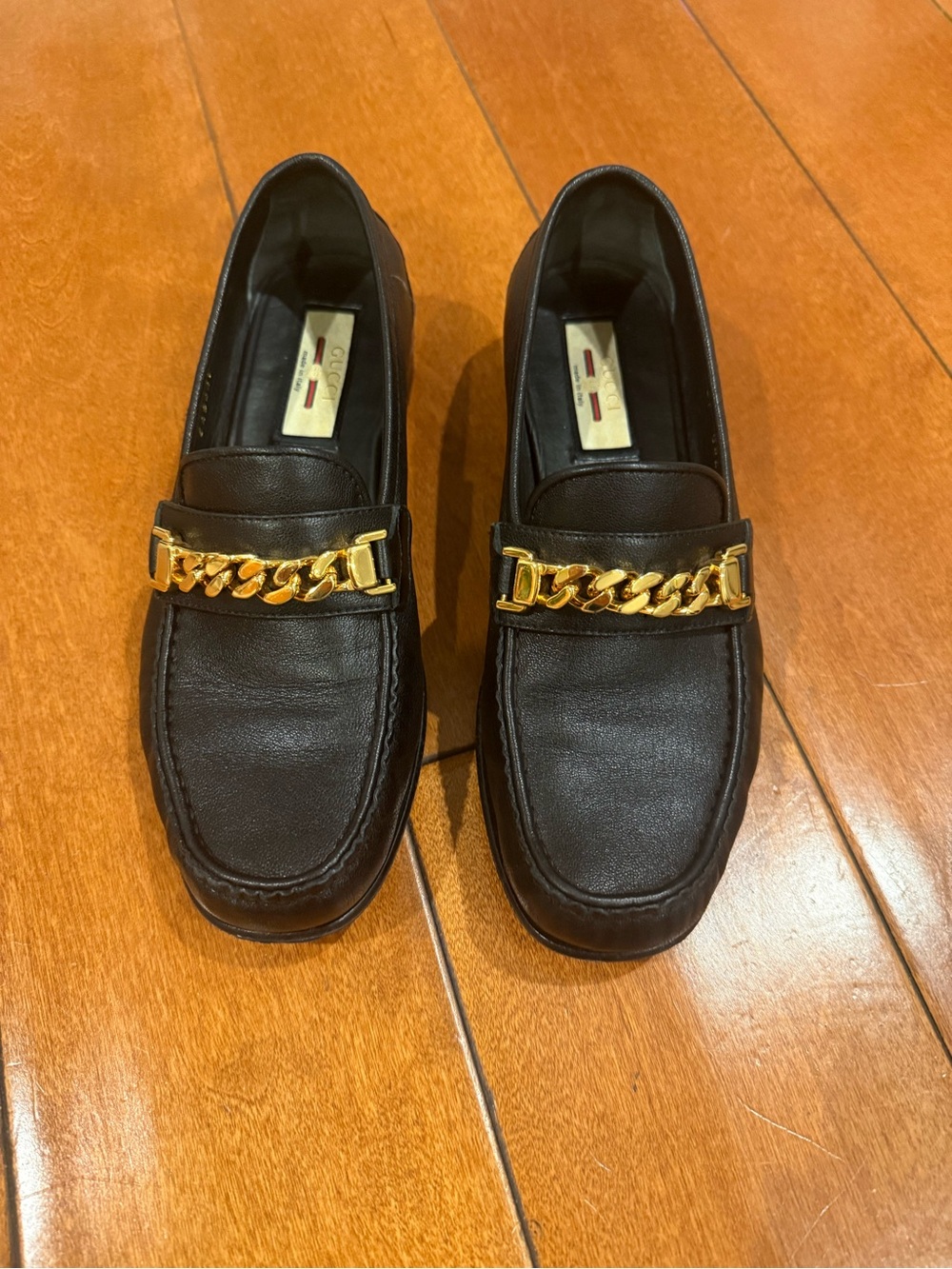 Gucci Black Leather Loafers with Gold Chain Accent